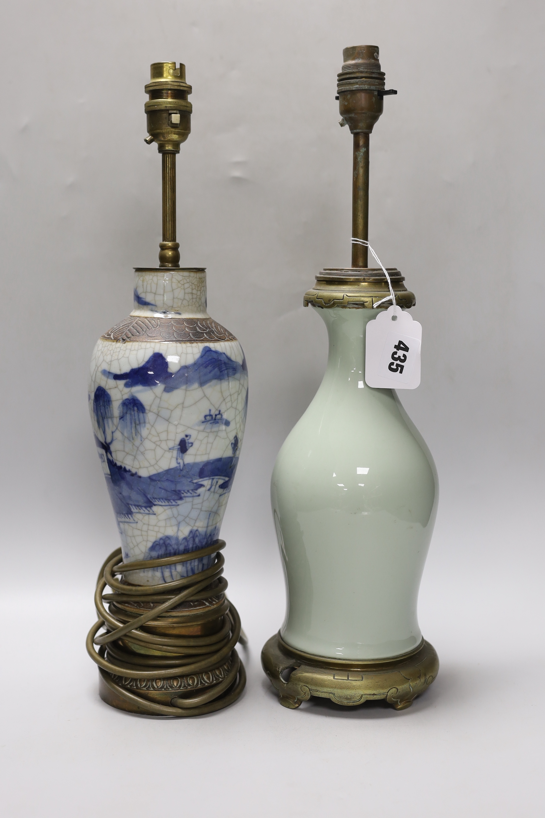 A Chinese celadon glazed lamp and a crackle glaze lamp, each 30cm